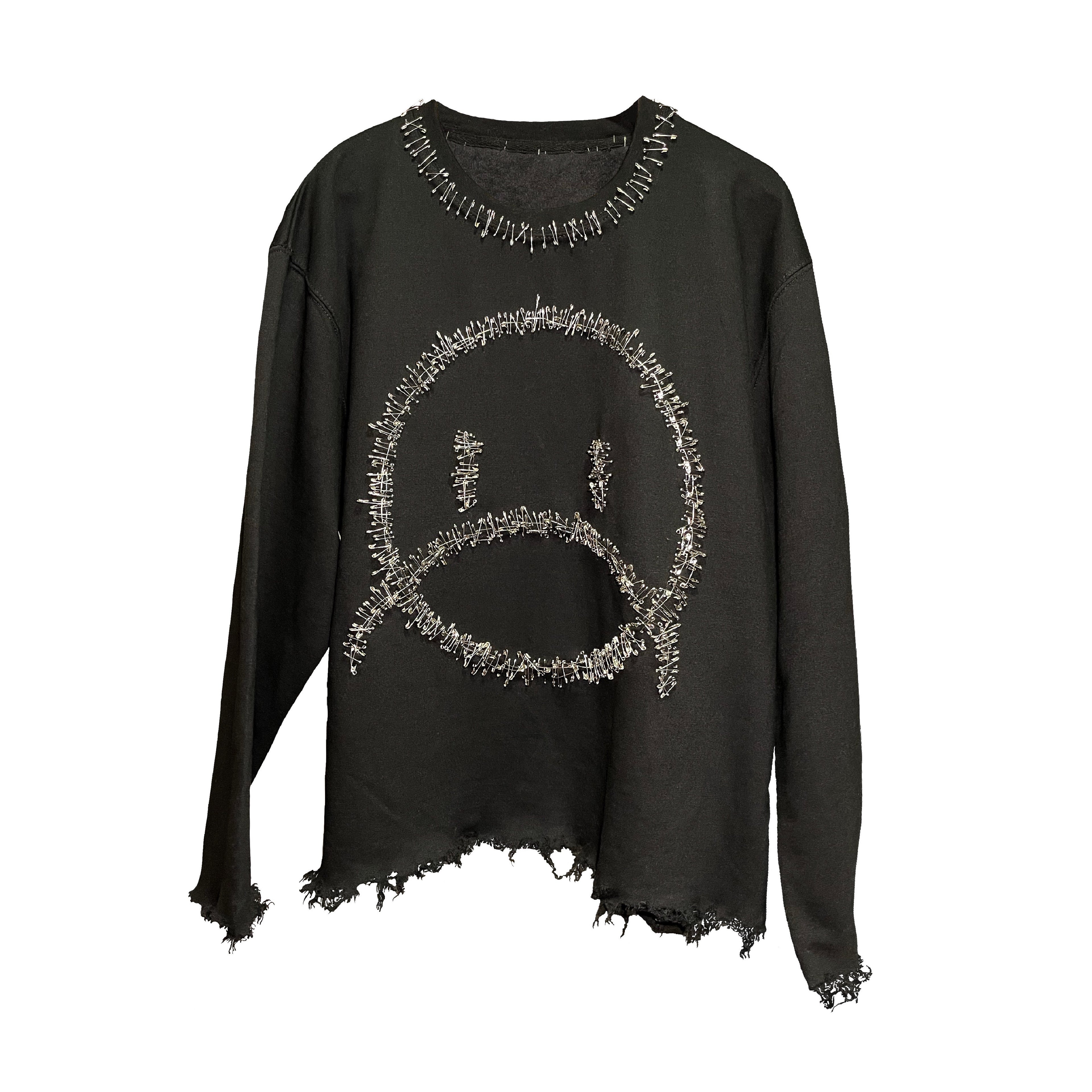 THE SADNESS SAFETY PIN JUMPER